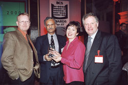 Arjuna's Steve Caughey and Santosh Shrivastava with BCS President Alastair Macdonald and broadcaster Kate Bellingham